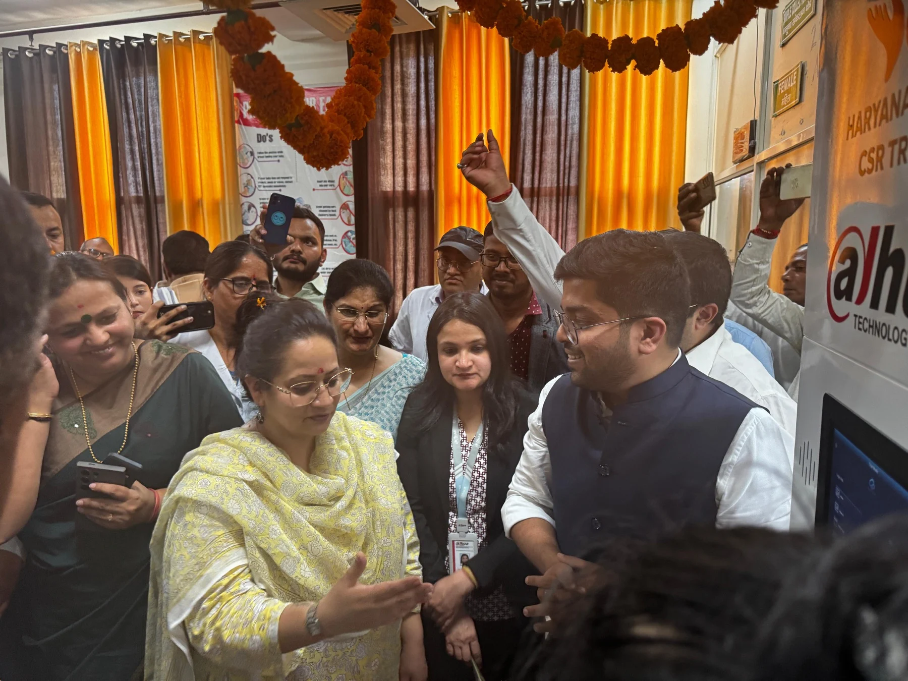 Inauguration crowd at a Haryana CSR trust health kiosk deployment for government community health programmes