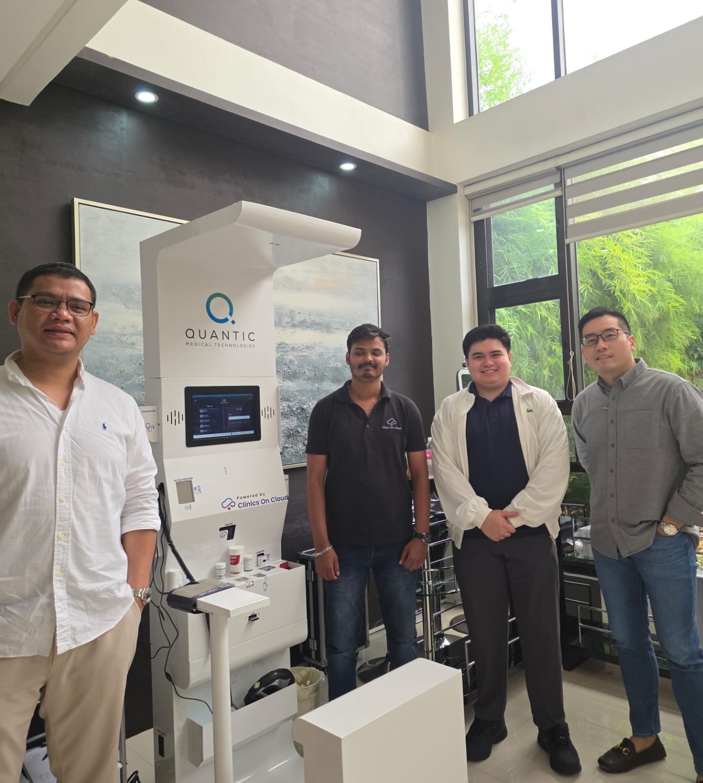 Clinics On Cloud health kiosk presence in the Philippines, with team and partners at a client site