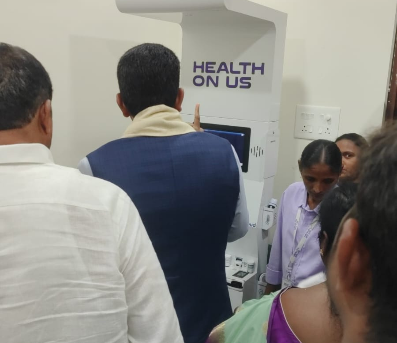 Health kiosk deployment under Clinics On Cloud's presence in Telangana, community health screening in progress